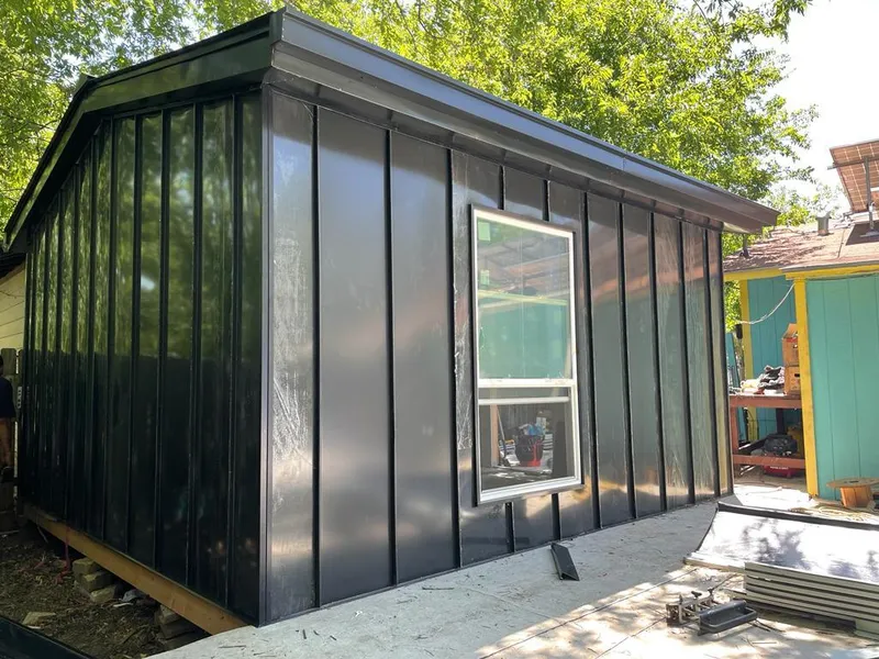 Black standing seam metal wall panels for Metal Roof Installation in Latimer