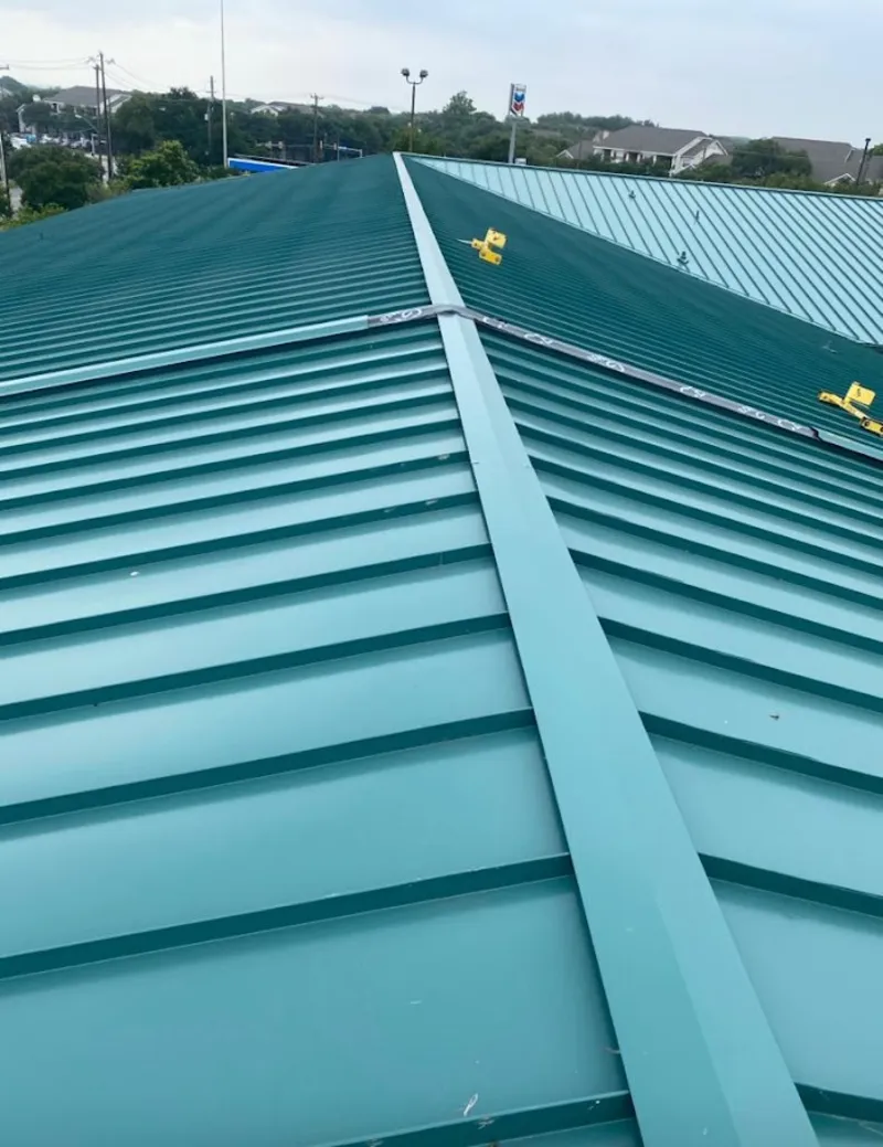 Green commercial metal roof ridge and valley for Metal Roof Repair in Latimer